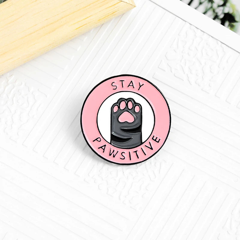 “Stay Pawsitive” Pink Cat Paw Enamel Pin