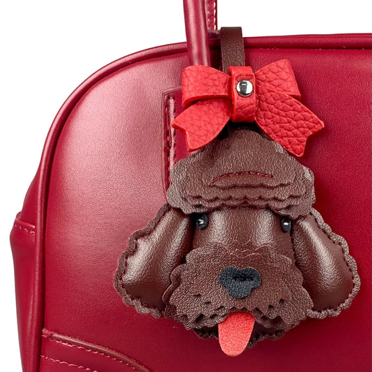Handmade Leather Teddy Dog Bag Charm with Detachable Red Bow Tie – 3D Puppy Keychain for Bags